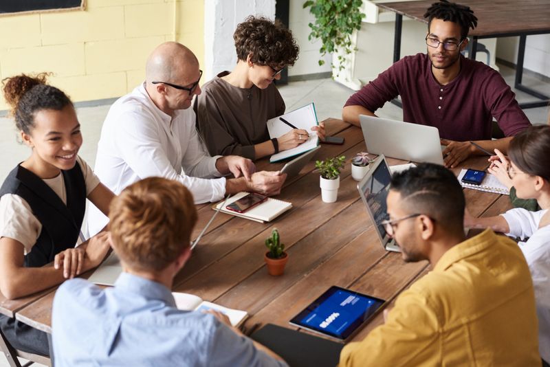 SEO Marketing Team Comparing Software Metrics